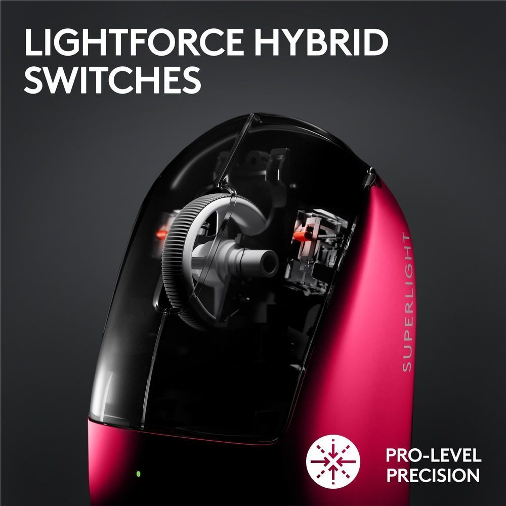Magenta wireless gaming mouse open interior view with internal switch mechanism