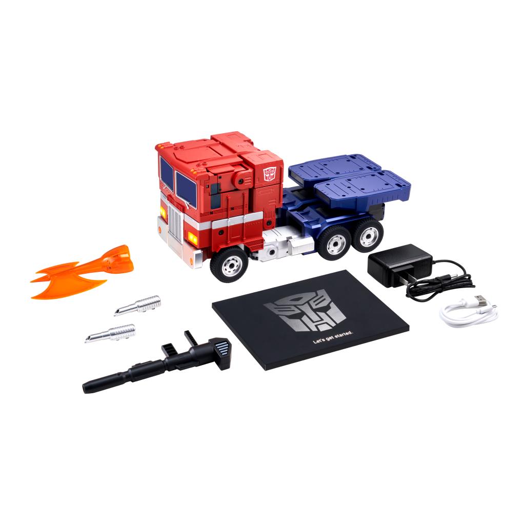 Transforming robot toy with red cab, blue trailer, orange flame accessory, and parts
