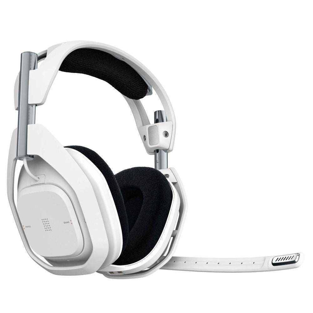 White wireless gaming headset with black ear pad and controls, docked on stand.