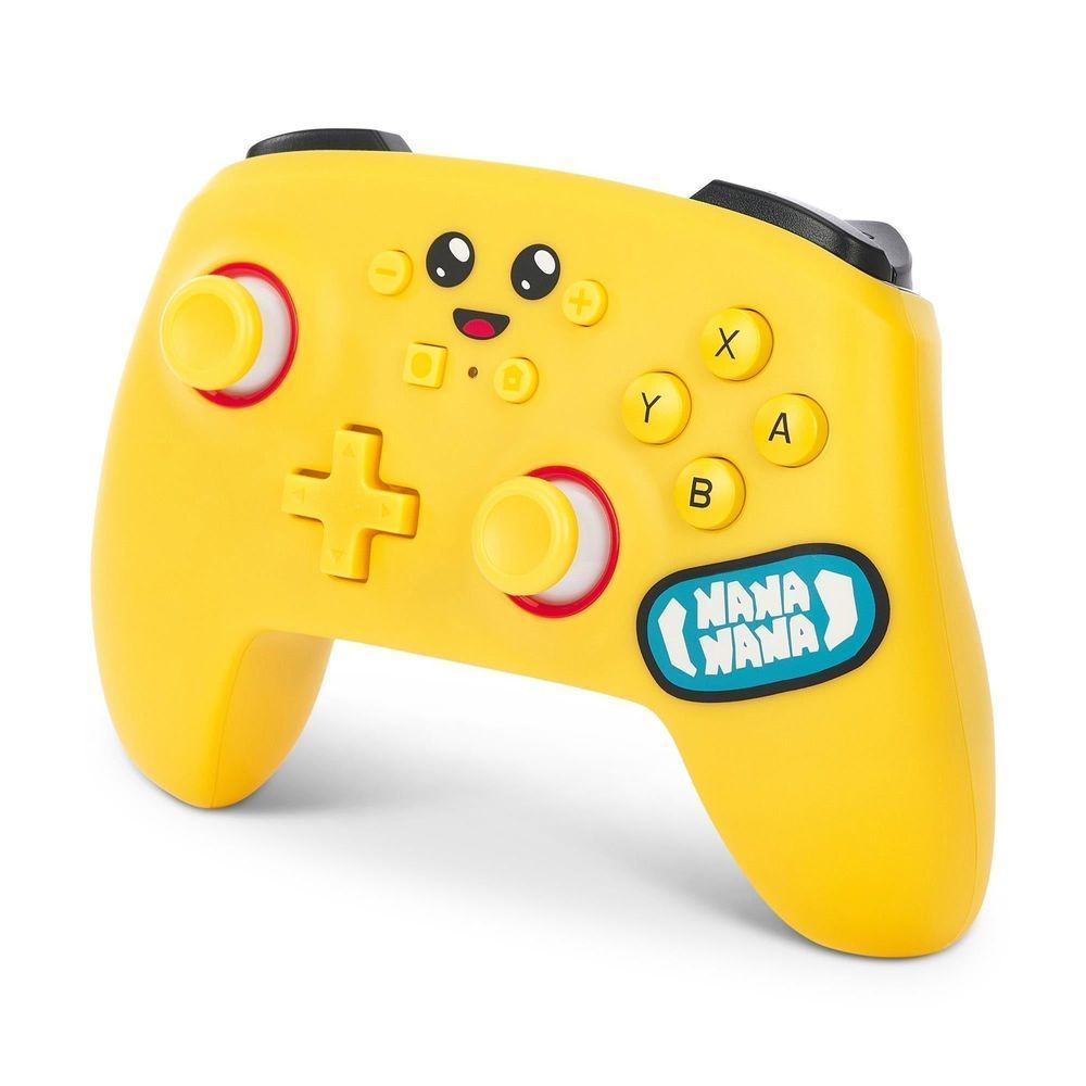 Yellow wireless game controller front-left angle with analog sticks, face graphic, and Nana Nana sticker