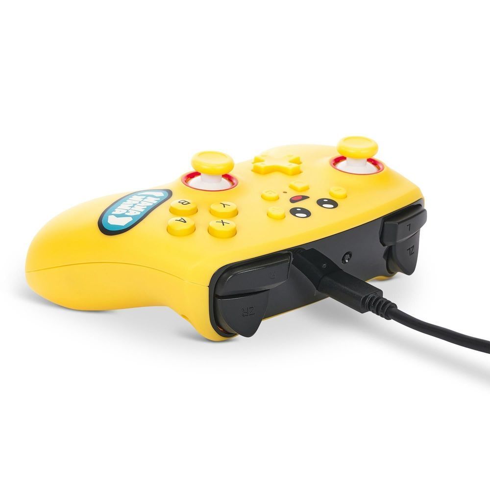 Yellow wireless game controller side view with rear grips, buttons, and charging cable port