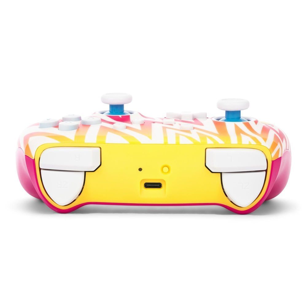 Yellow and pink wireless game controller front with white shoulder buttons