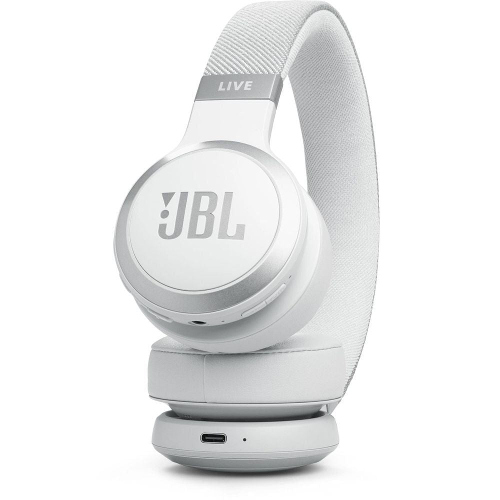 White on-ear wireless headphones showing headband label, ear cup controls and port
