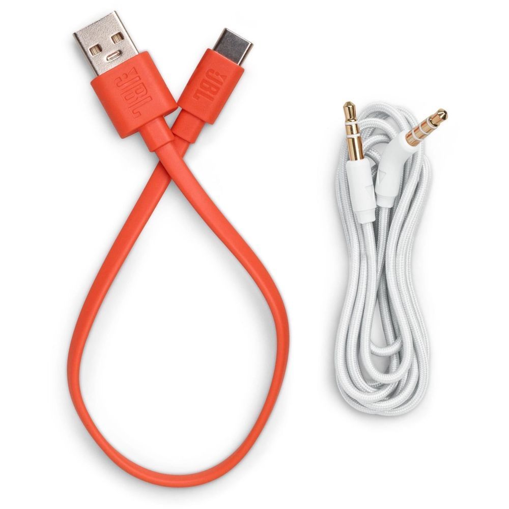 White headphone accessory cables with audio plugs and orange tie strap