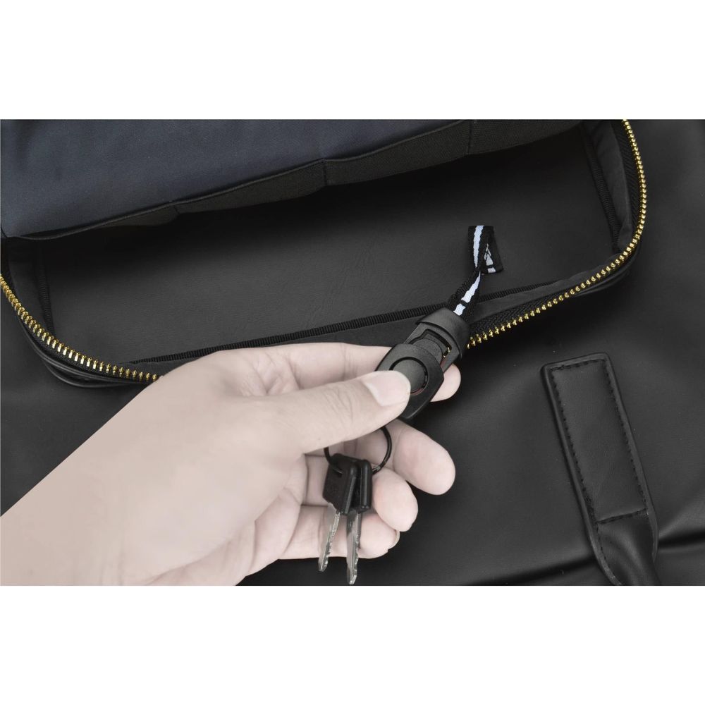 Black laptop briefcase close-up of zipper pull with hand holding a key fob.