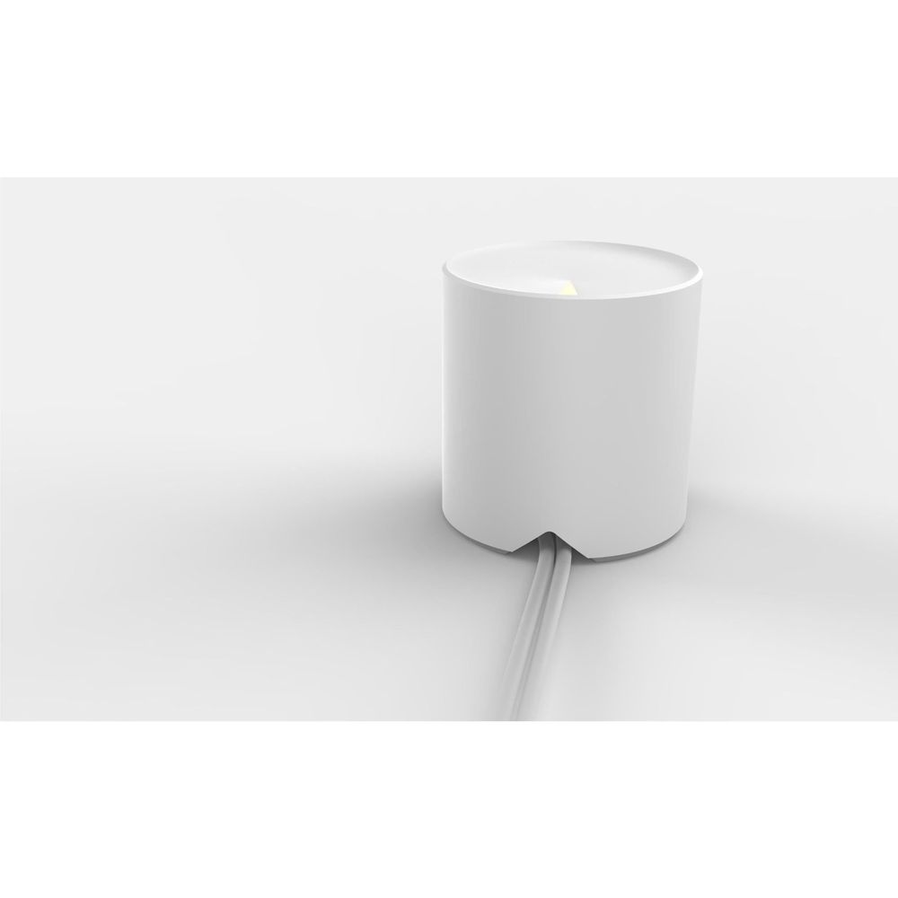 White TP-Link Deco mesh Wi‑Fi router pod with power cable connected and status light