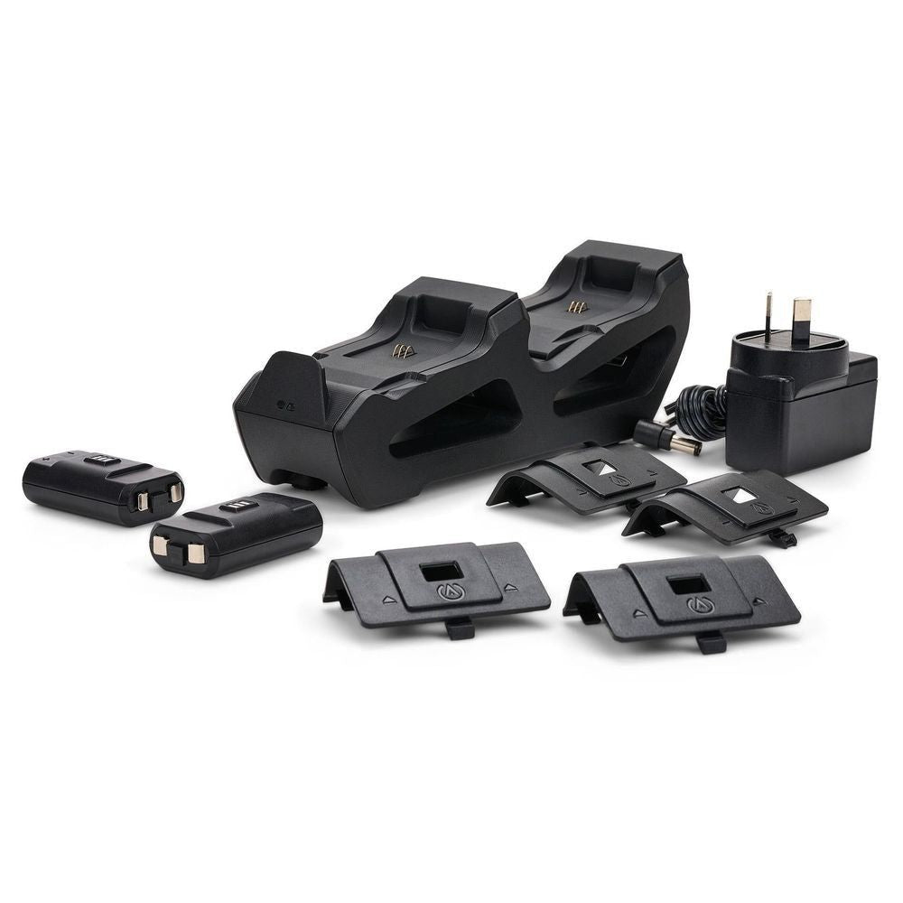 Black charging station with included cables and spare controller plates