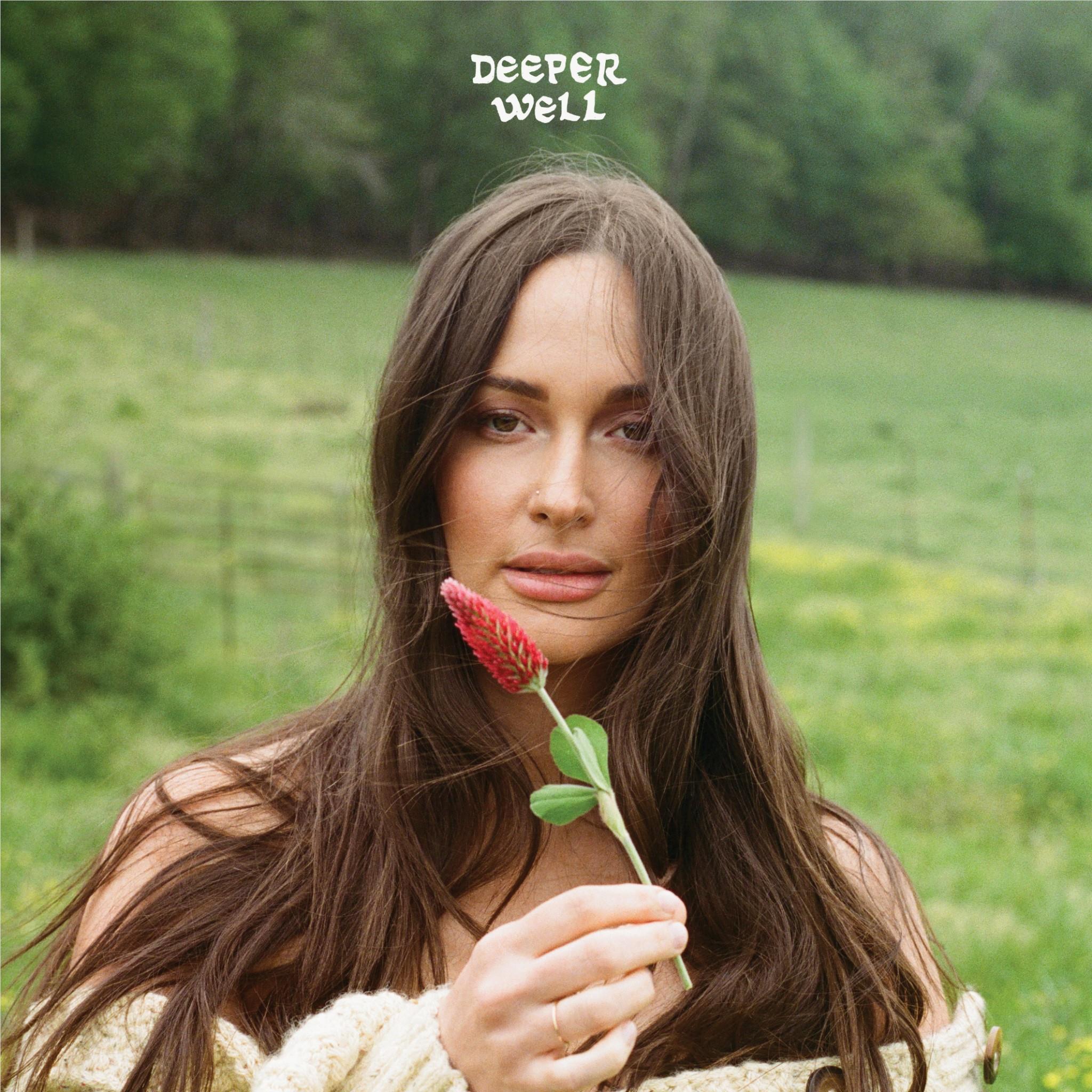 Deeper Well album artwork with woman holding red flower on green field background