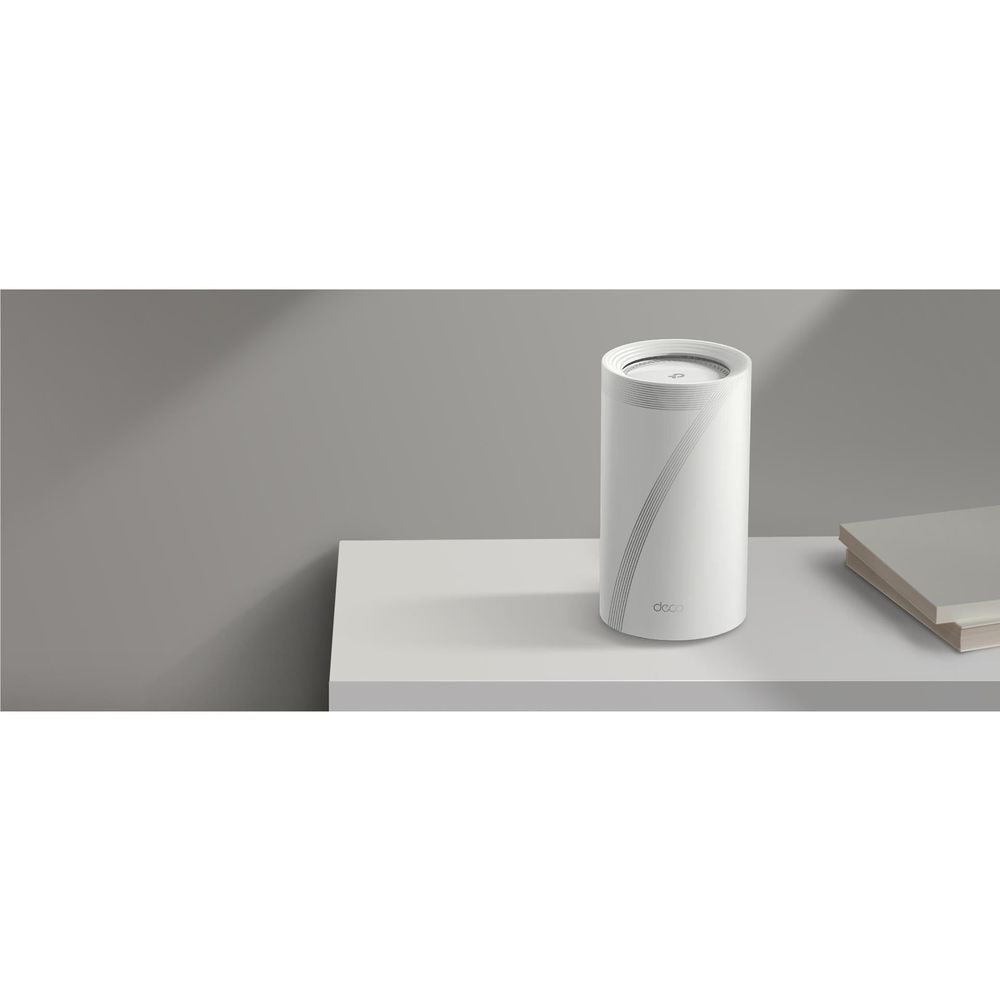 White mesh router pod on tabletop with circular top light