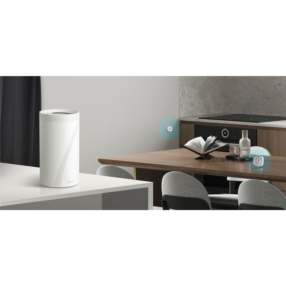 White mesh router pod on side table in a modern living room