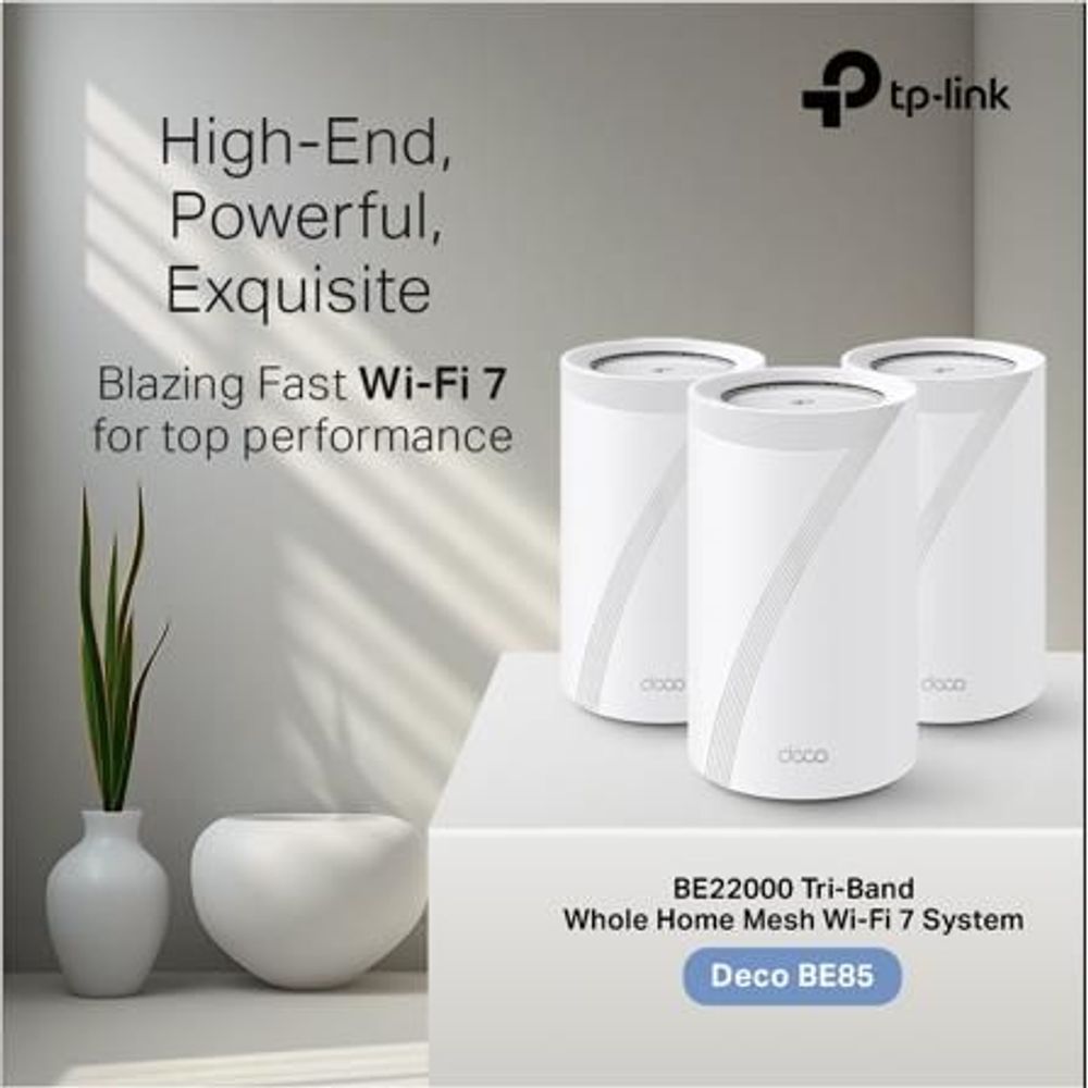 Three white Deco BE85 mesh pods on console, labeled BE22000 Tri‑Band
