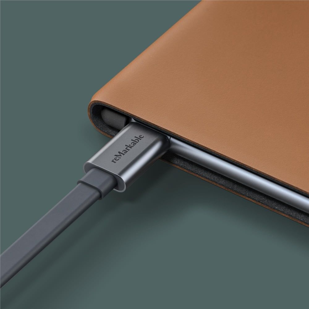 Brown leather folio with cable charging port access