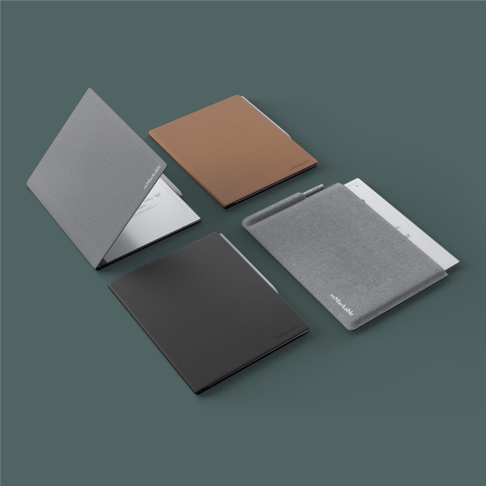 Brown leather book folio laid flat, with other cover styles shown