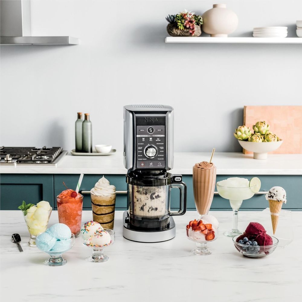 Ninja ice cream maker with assorted ice cream cups and cones