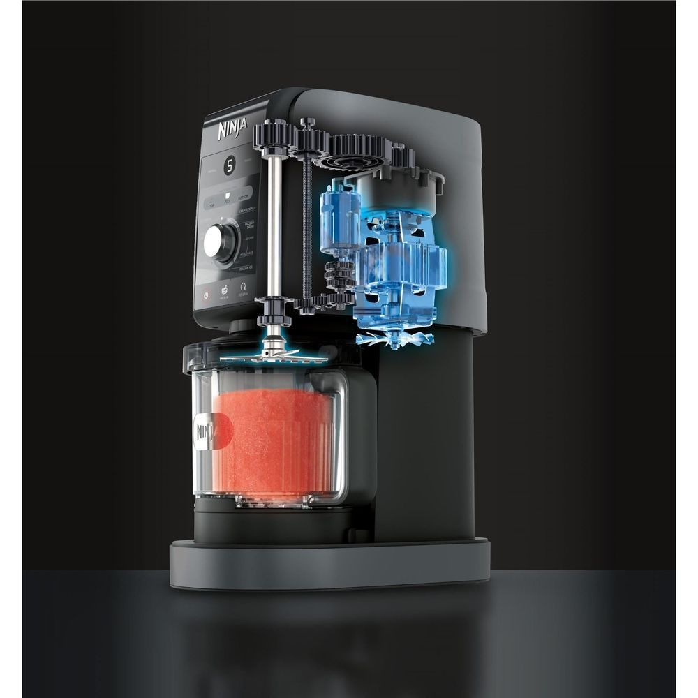 Ninja ice cream maker cutaway showing internal blue gears and red frozen cup