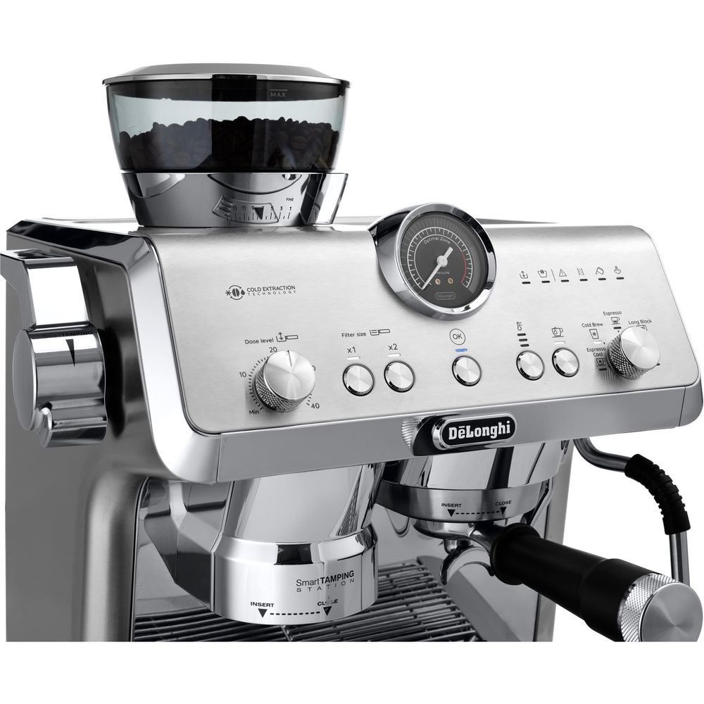 Stainless steel espresso machine with control panel dial and steam wand
