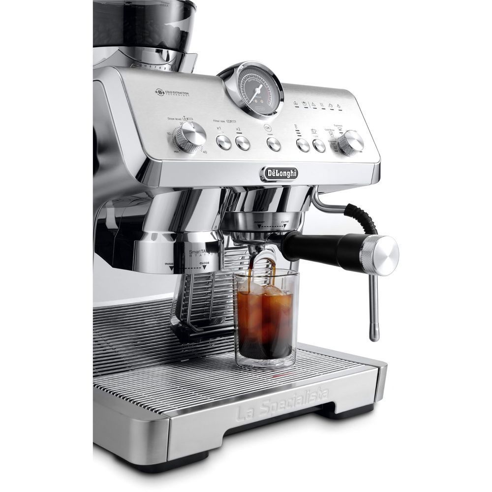 Stainless steel espresso machine with cup under brew spout and drip tray