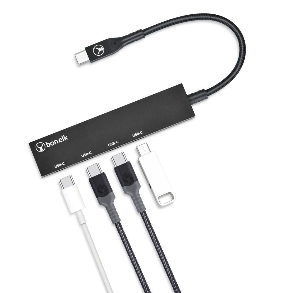 Black USB-C hub with four included USB-C connectors and braided cable