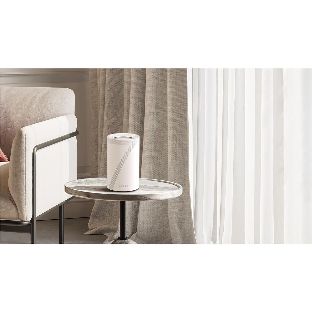 White Deco mesh Wi-Fi 7 node on round table