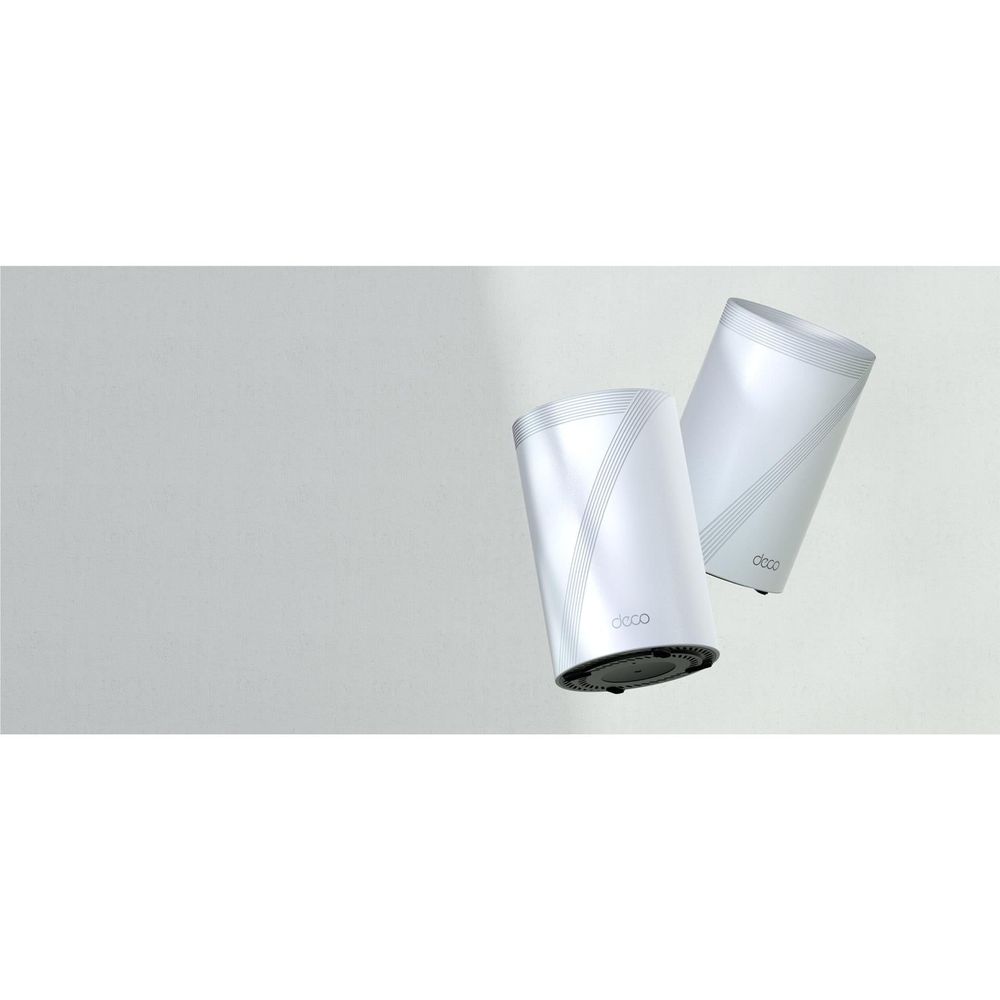 TP-Link Deco mesh Wi‑Fi nodes, two white cylindrical units shown from angled perspective