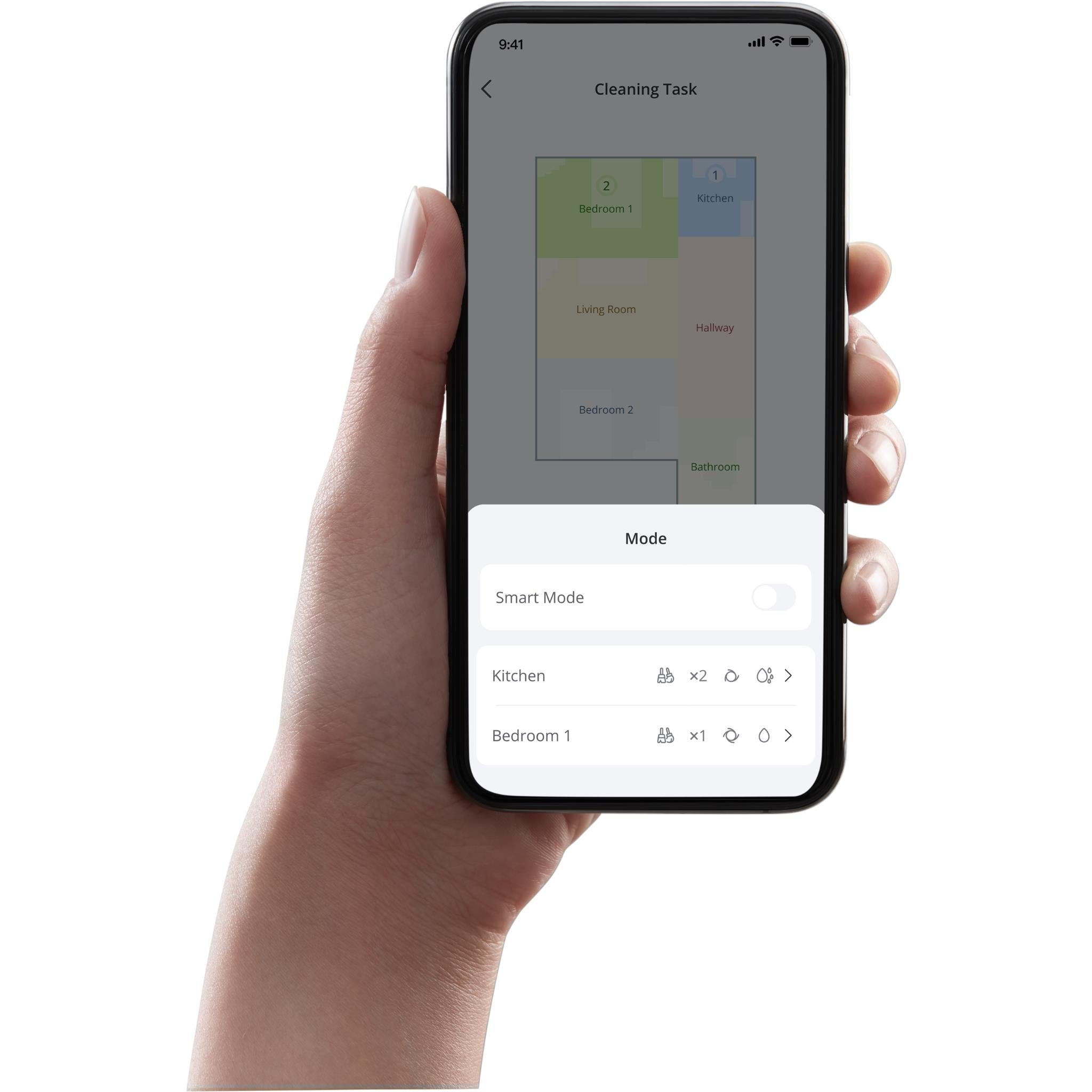 Smartphone app screen in hand showing cleaning task mode for robot vacuum