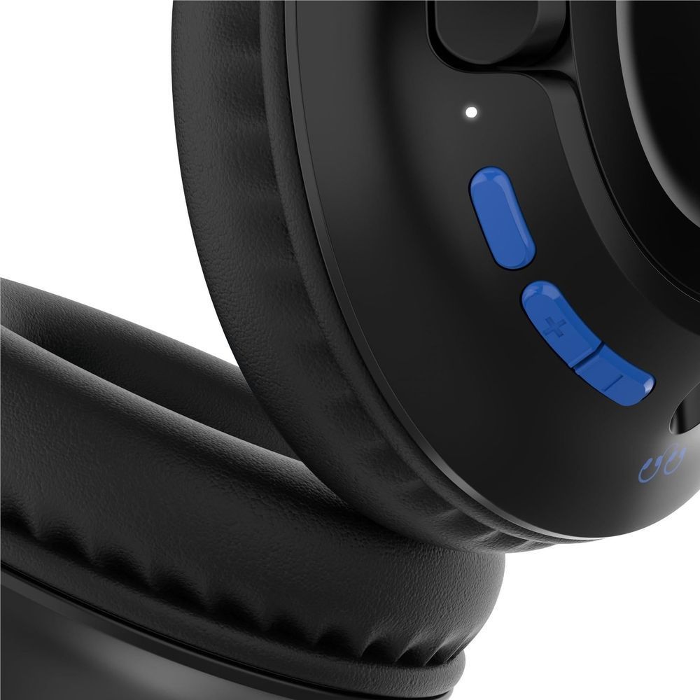 Black cushioned ear pad of a wireless over-ear kids headset with blue control buttons