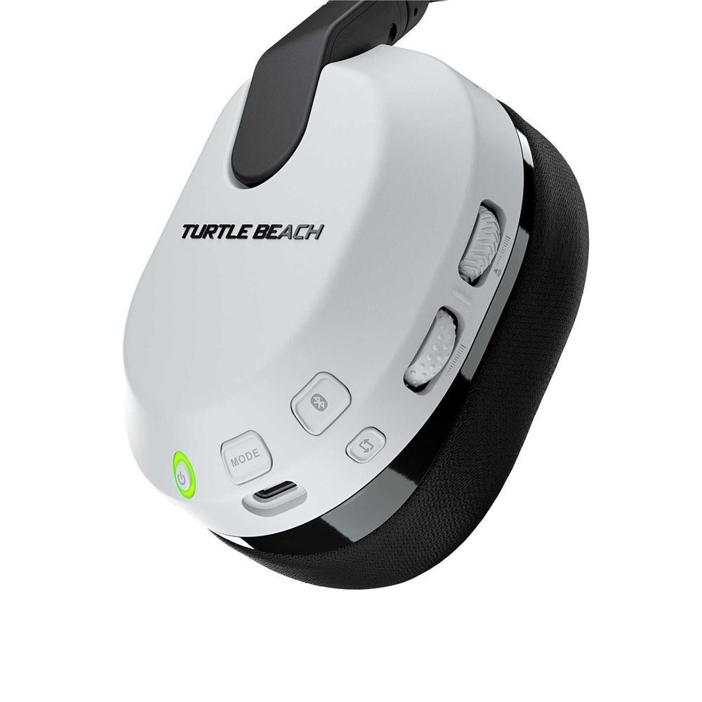 Wireless gaming headset earcup with buttons and green power indicator light