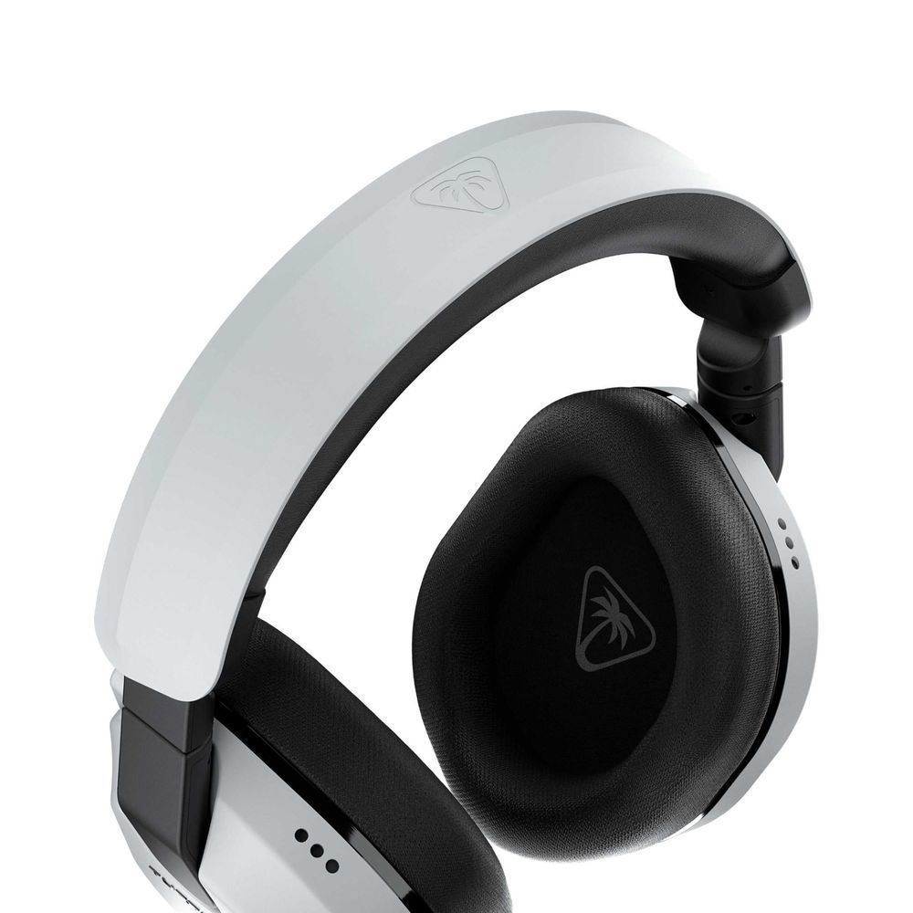 White wireless gaming headset with black ear cushion and side button panel