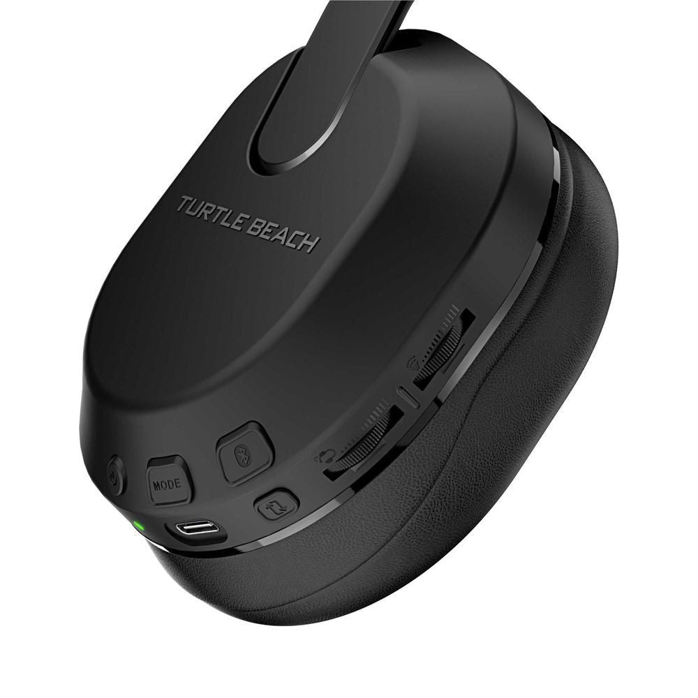 Black earcup of wireless headset showing MODE controls, ports, and status light