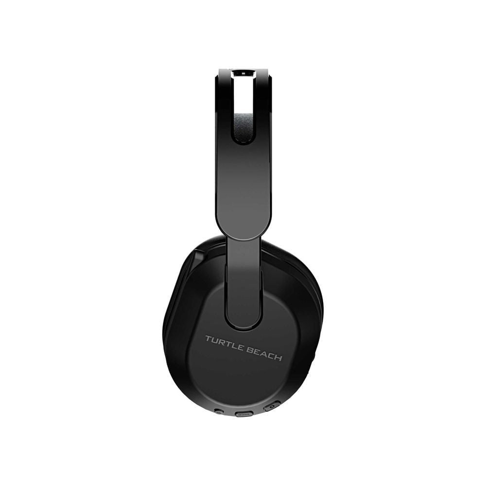 Black wireless headset earcup bottom view with charging/port area and logo