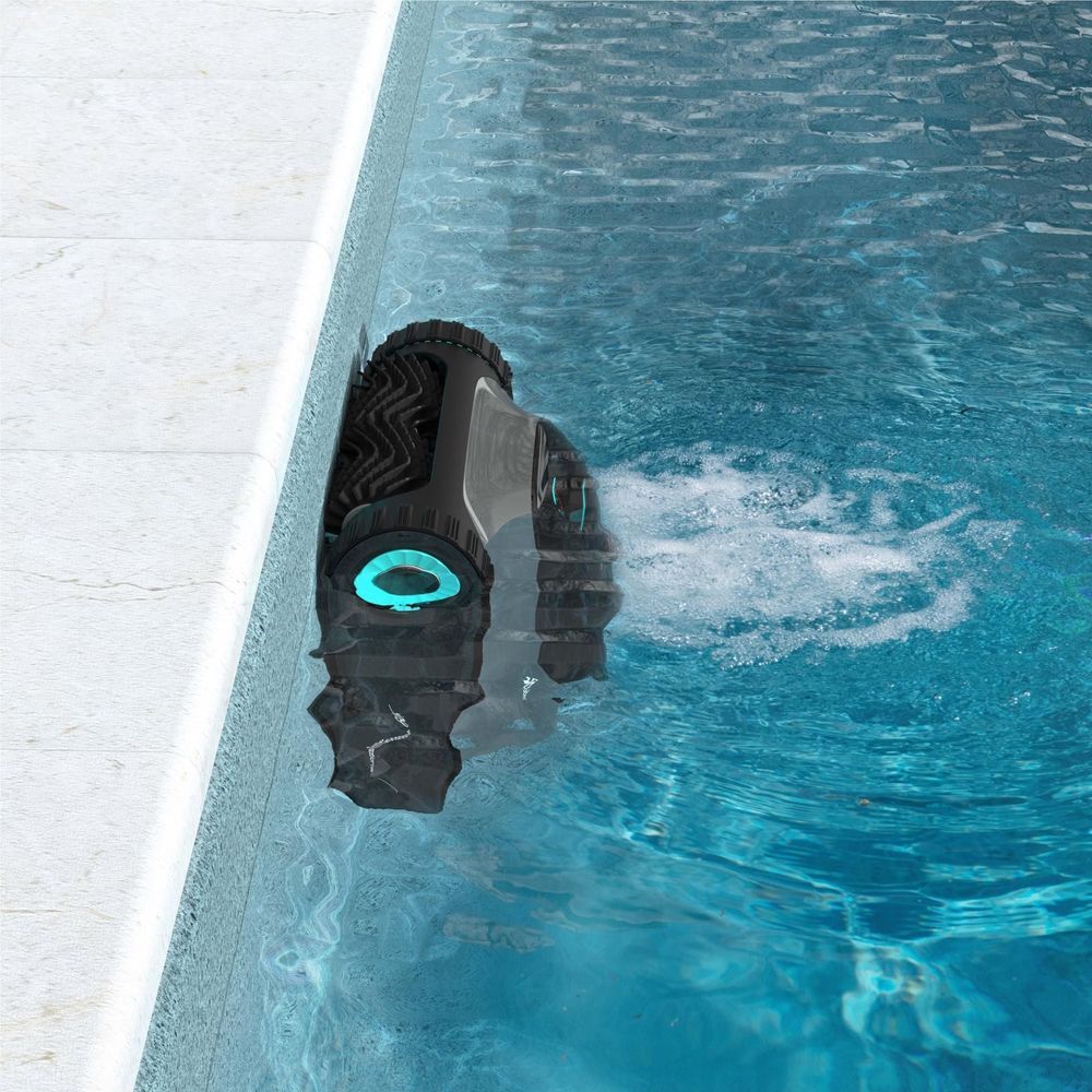 Robotic pool cleaner partially in water, black wheels with aqua-ring lens