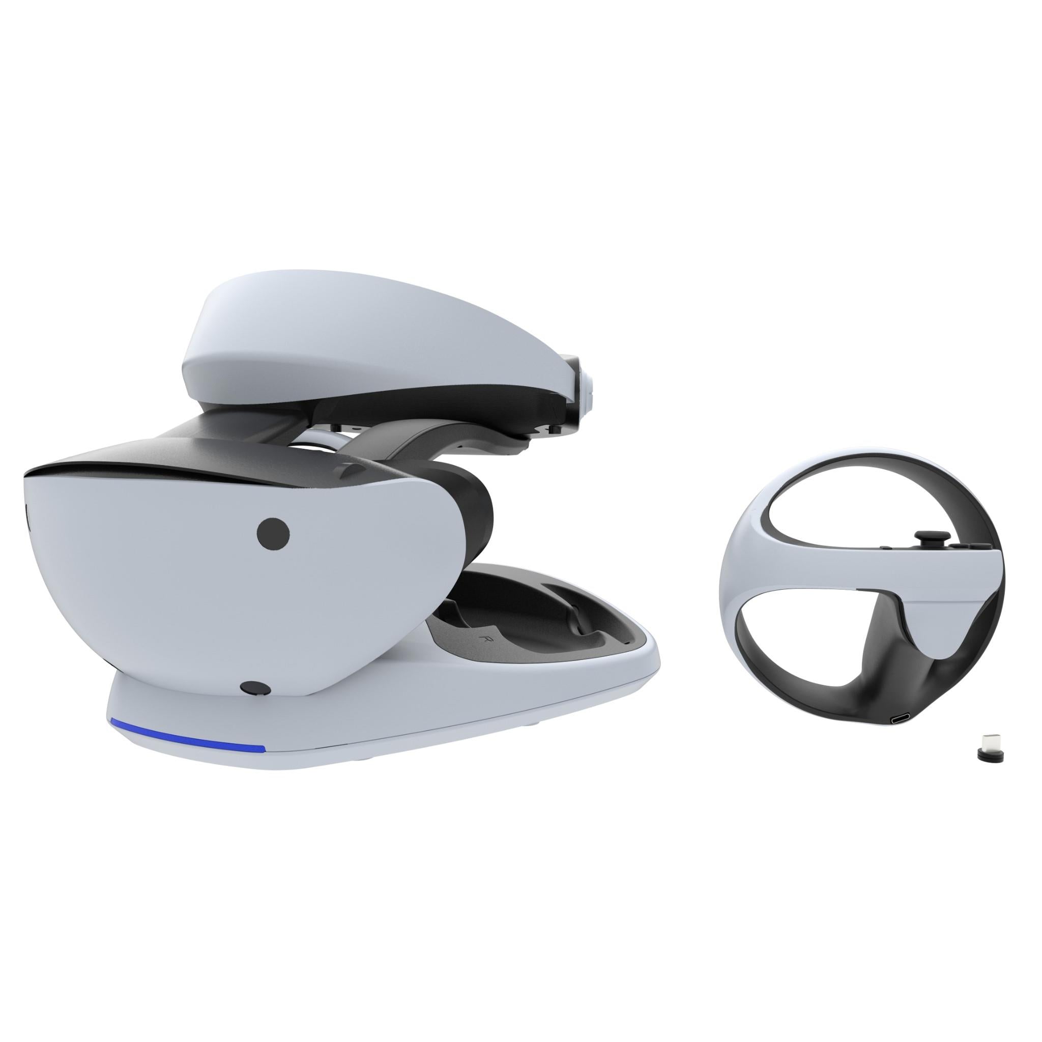White VR headset charging stand with controllers and cable, three-quarter view