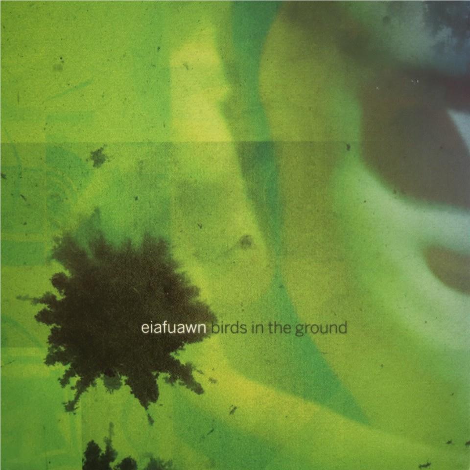 Green abstract artwork with dark bird and foliage silhouettes