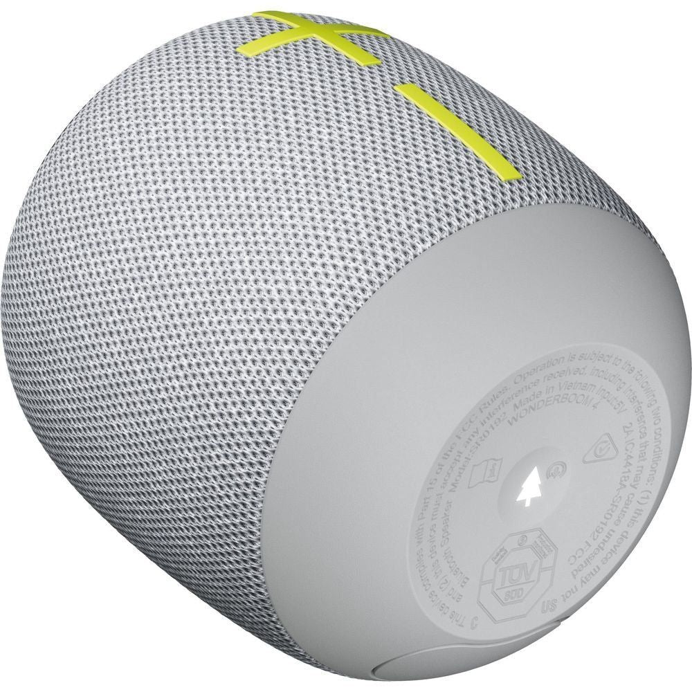 Gray fabric portable Bluetooth speaker side view with yellow plus and light gray base