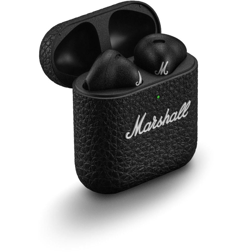 Black wireless earbuds in open charging case with “Marshall” logo on front