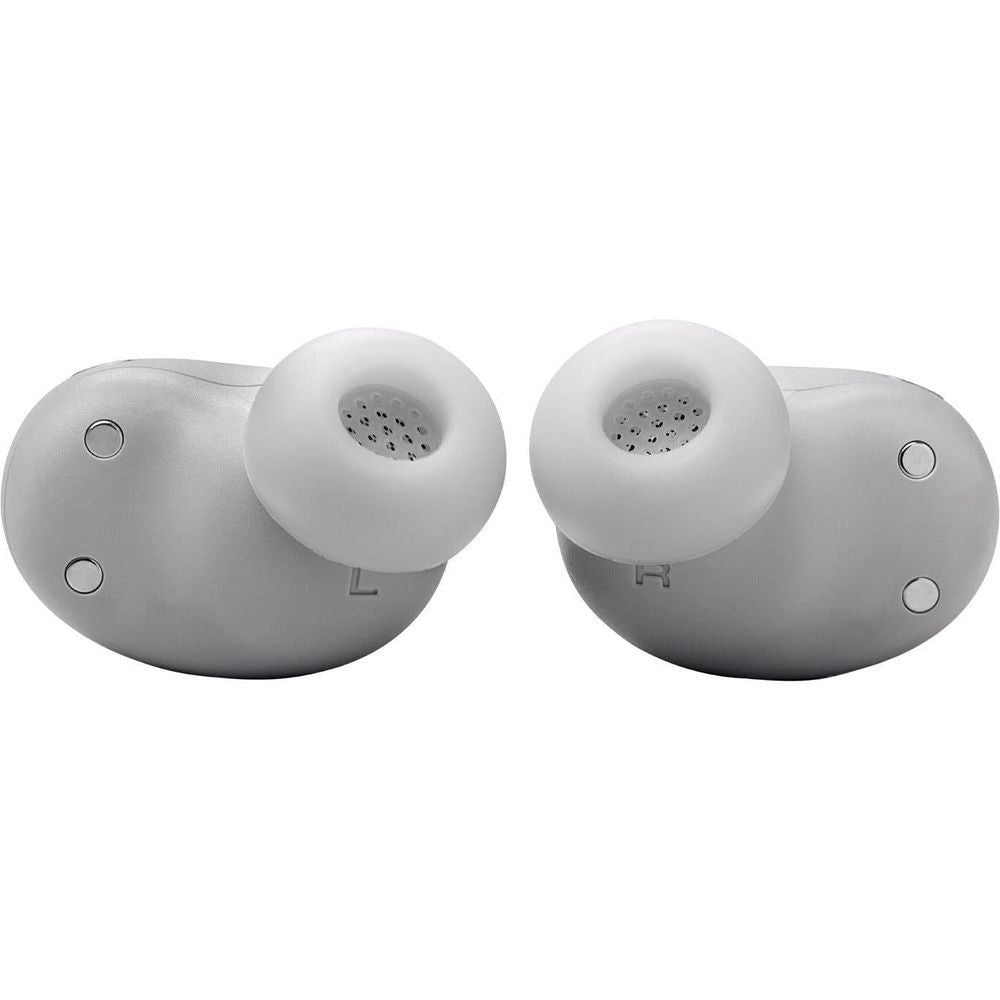 Silver wireless earbuds from side/back view with speaker mesh and buttons