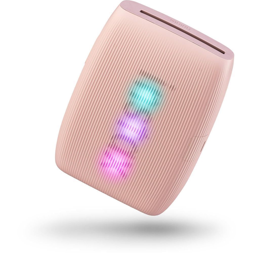 Rose pink mini smartphone photo printer with top slot and side button