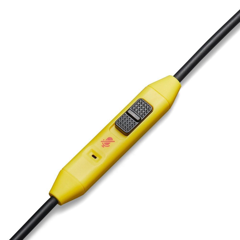 Yellow inline control module on black cable with textured button area