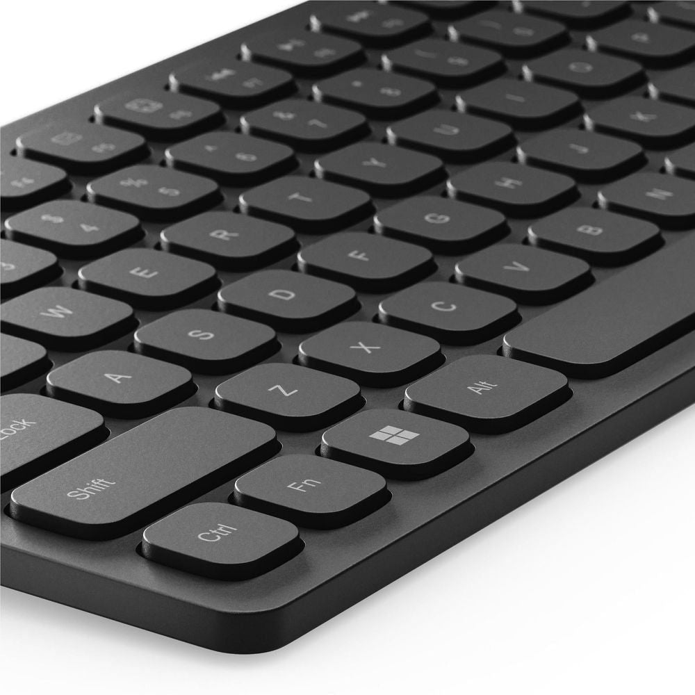 Black keyboard key close-up with shortcut symbols and rounded keycaps
