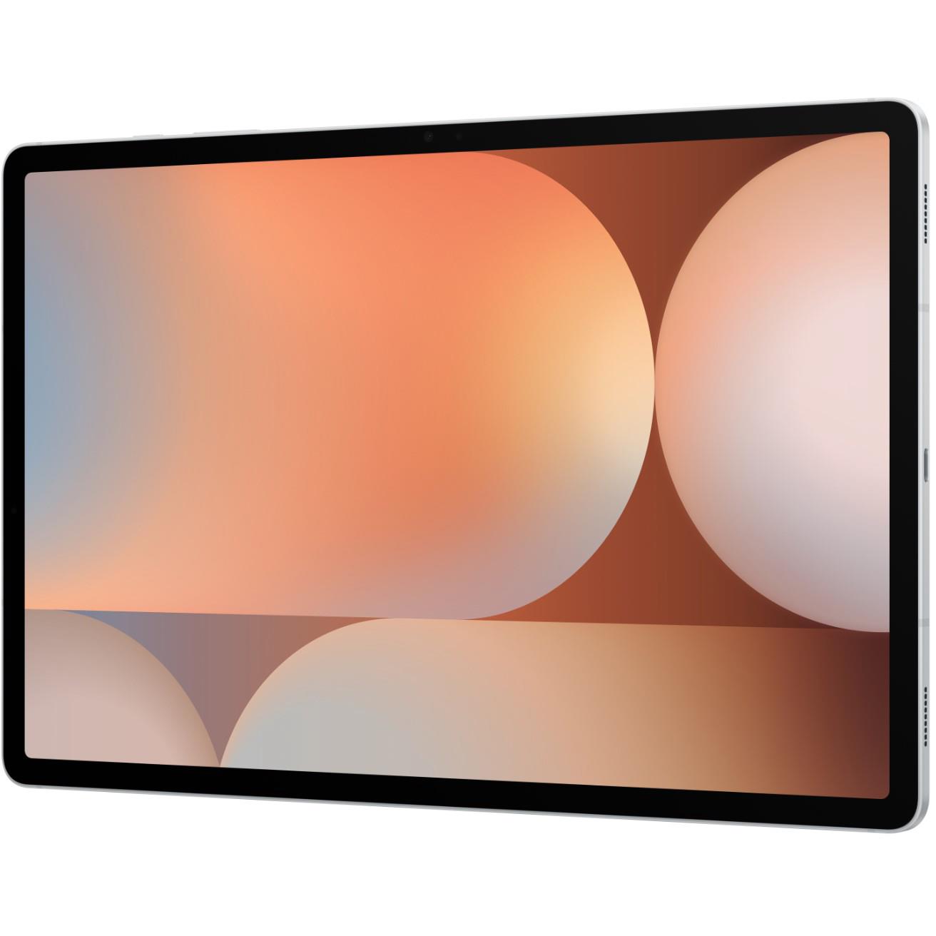 Silver tablet with 12.4-inch display and orange abstract wallpaper, angled front view