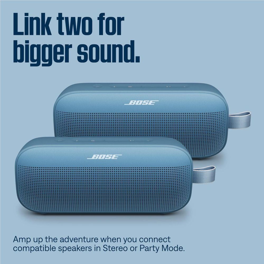 Two Bose portable Bluetooth speakers in blue dusk with front grilles and side straps