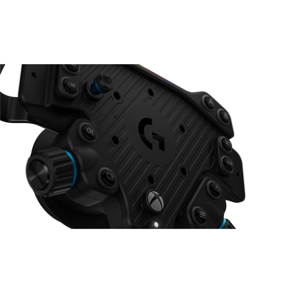 Close-up of black wheel hub panel with G logo and blue control dials.