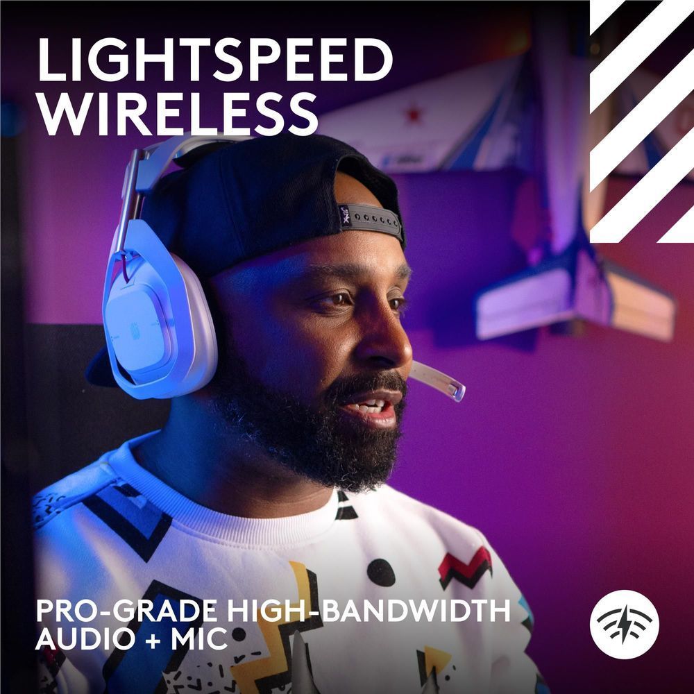 White wireless gaming headset with boom mic on a person