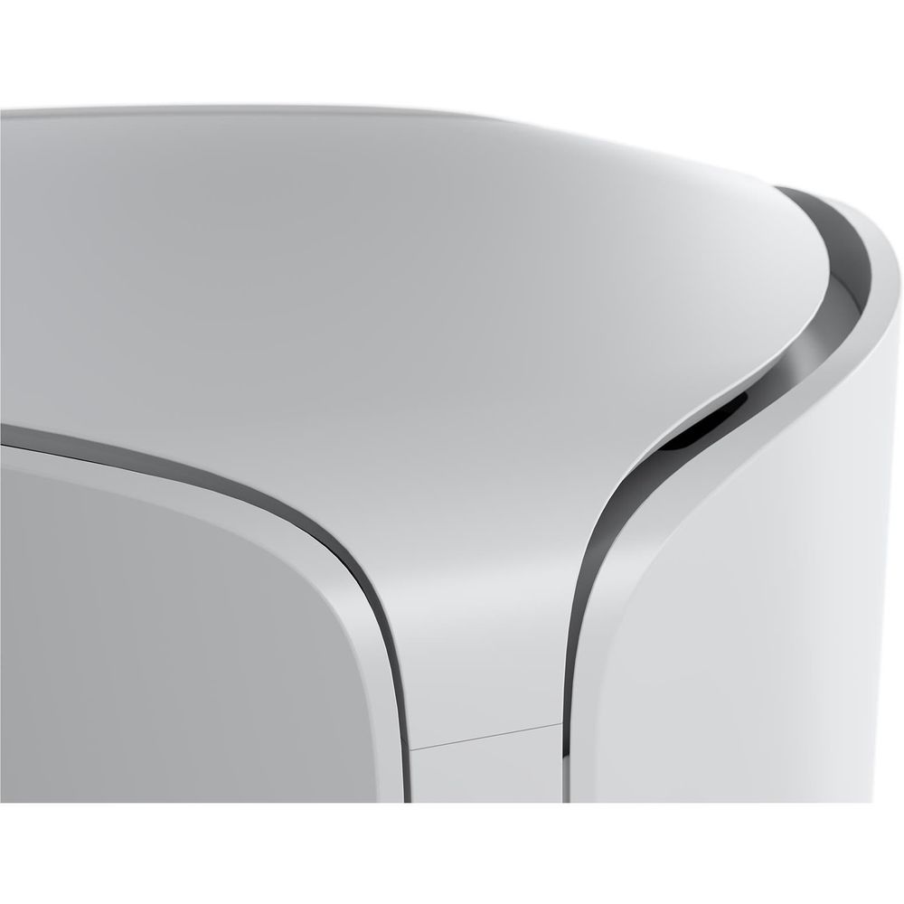 White NETGEAR WiFi 7 mesh satellite top corner close-up with curved design