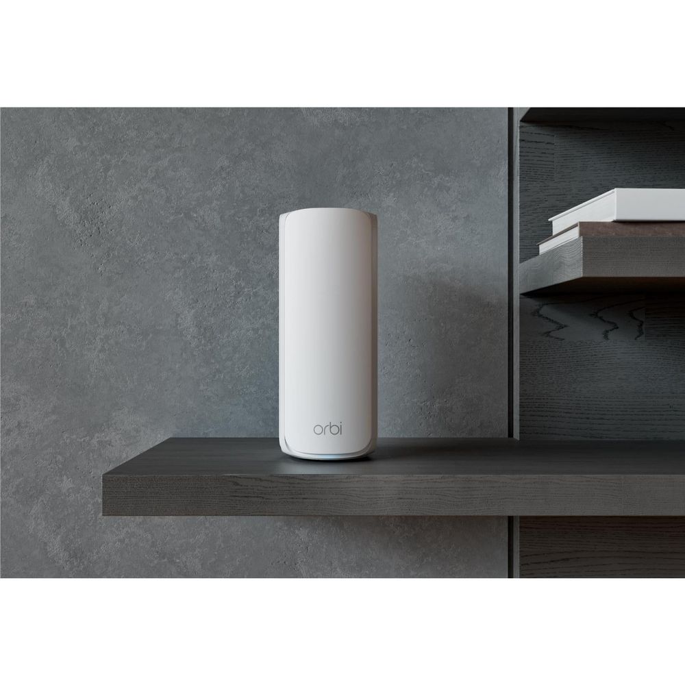 White NETGEAR WiFi 7 mesh satellite on shelf