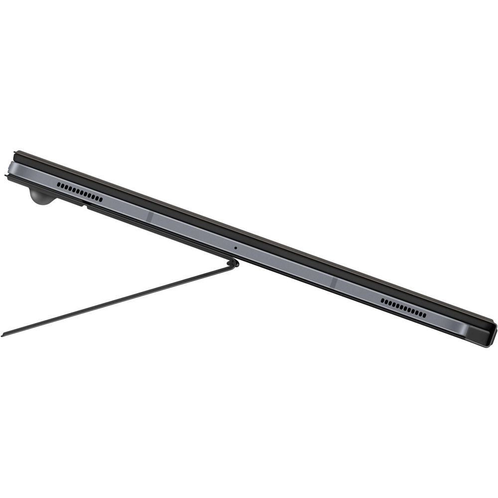 Black keyboard cover with trackpad, thin edge view with ports and speaker grilles