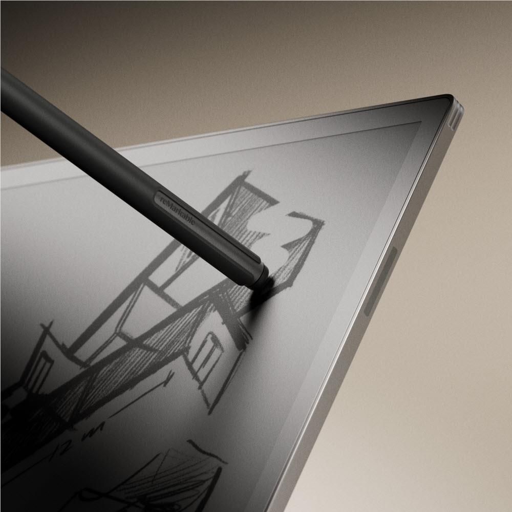 Marker stylus drawing on an e-paper tablet screen with sketch lines visible