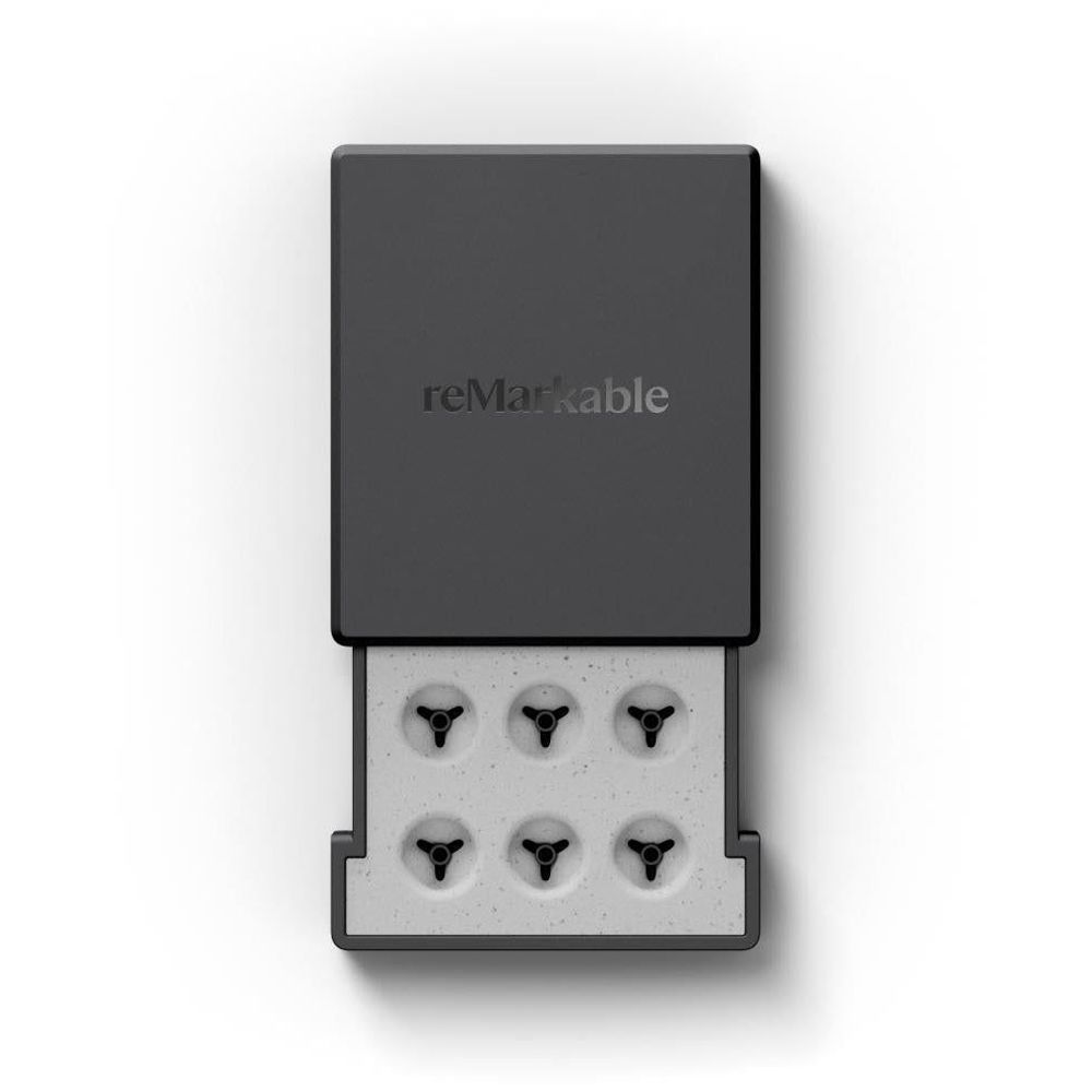 Black marker tip refill tray with six nibs, open in case