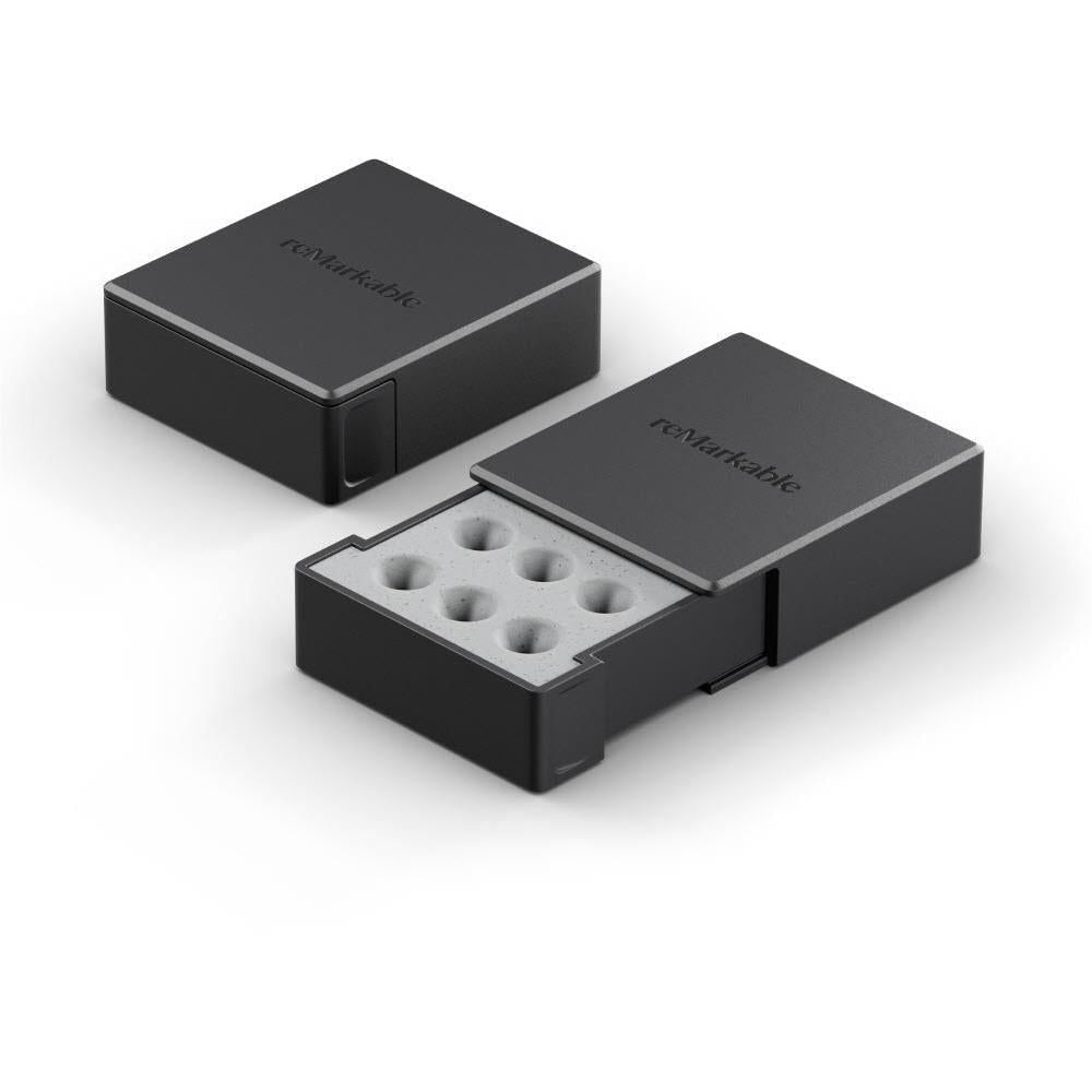 Black refill case with open tray holding six marker tips