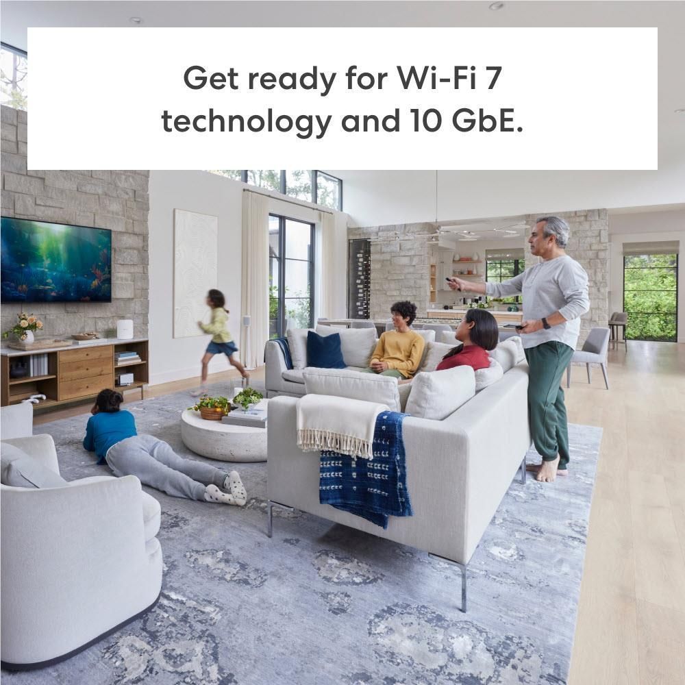White eero Max 7 Wi-Fi 7 mesh router in a living room